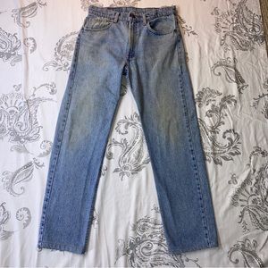 Vintage‎ Levis 505 Made in USA Light
Wash Denim Jeans 32" × 28 1/2"
Distressed